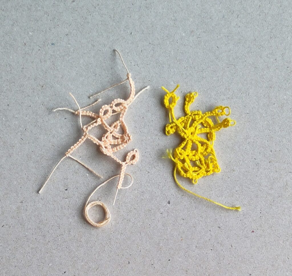 Zwei Occhi Teststücke in rosa und gelb.