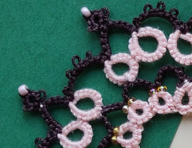 Braun-Rosa-Occhi-Spitze mit Perlen